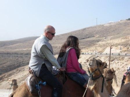 Chris and Sammi on a camel