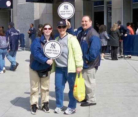 sign people at New Yankee Stadium